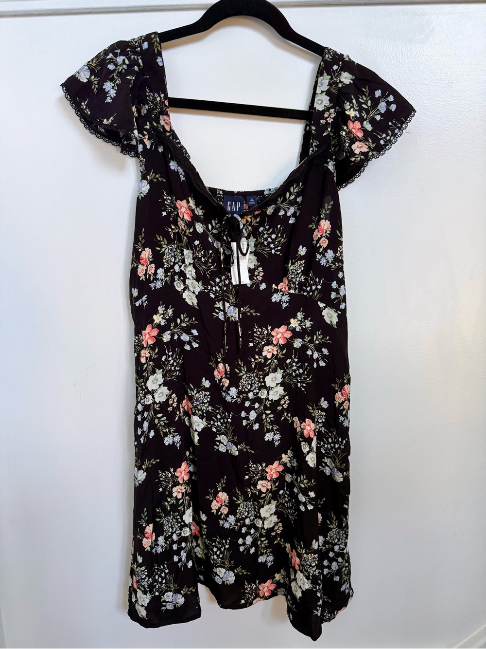 Floral women's top with tie neckline